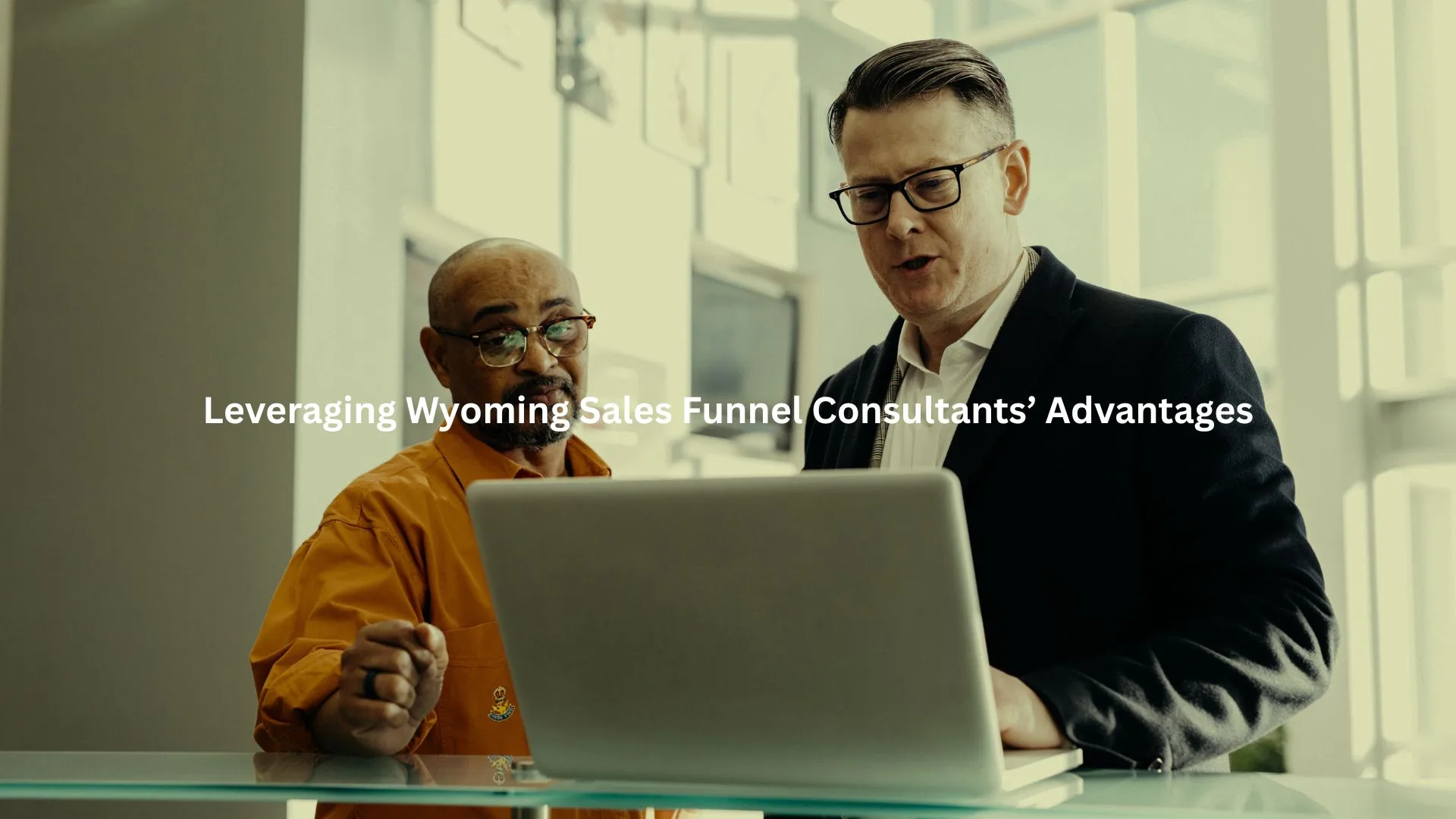 Two business professionals collaborating on leveraging the advantages of Wyoming sales funnel consultants.